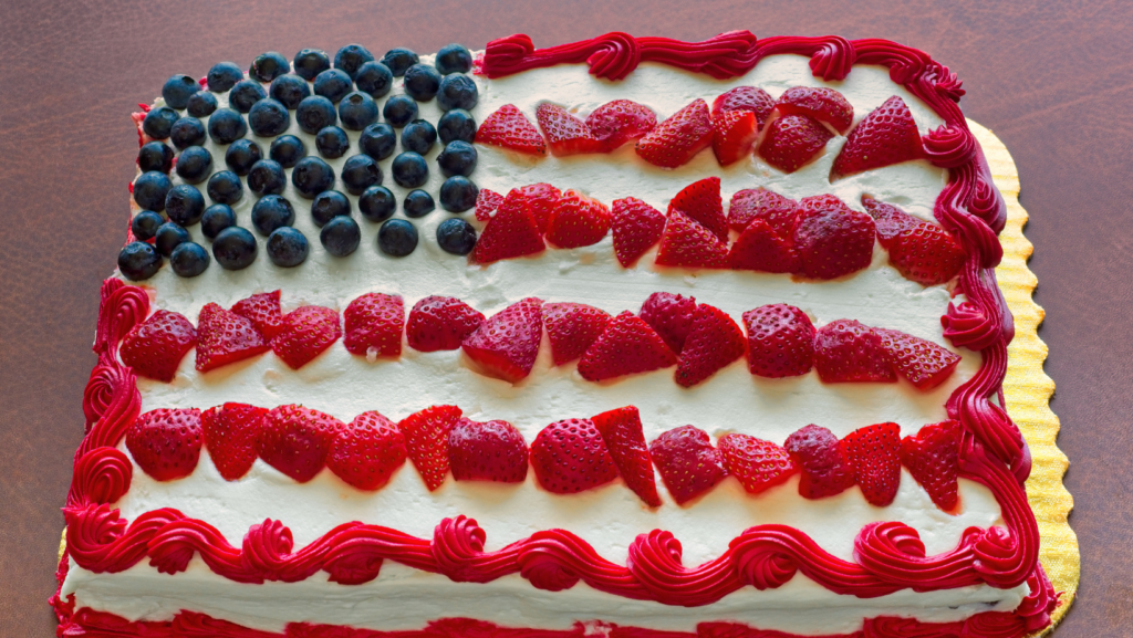 Patriotic party cake with blue berries and strawberries